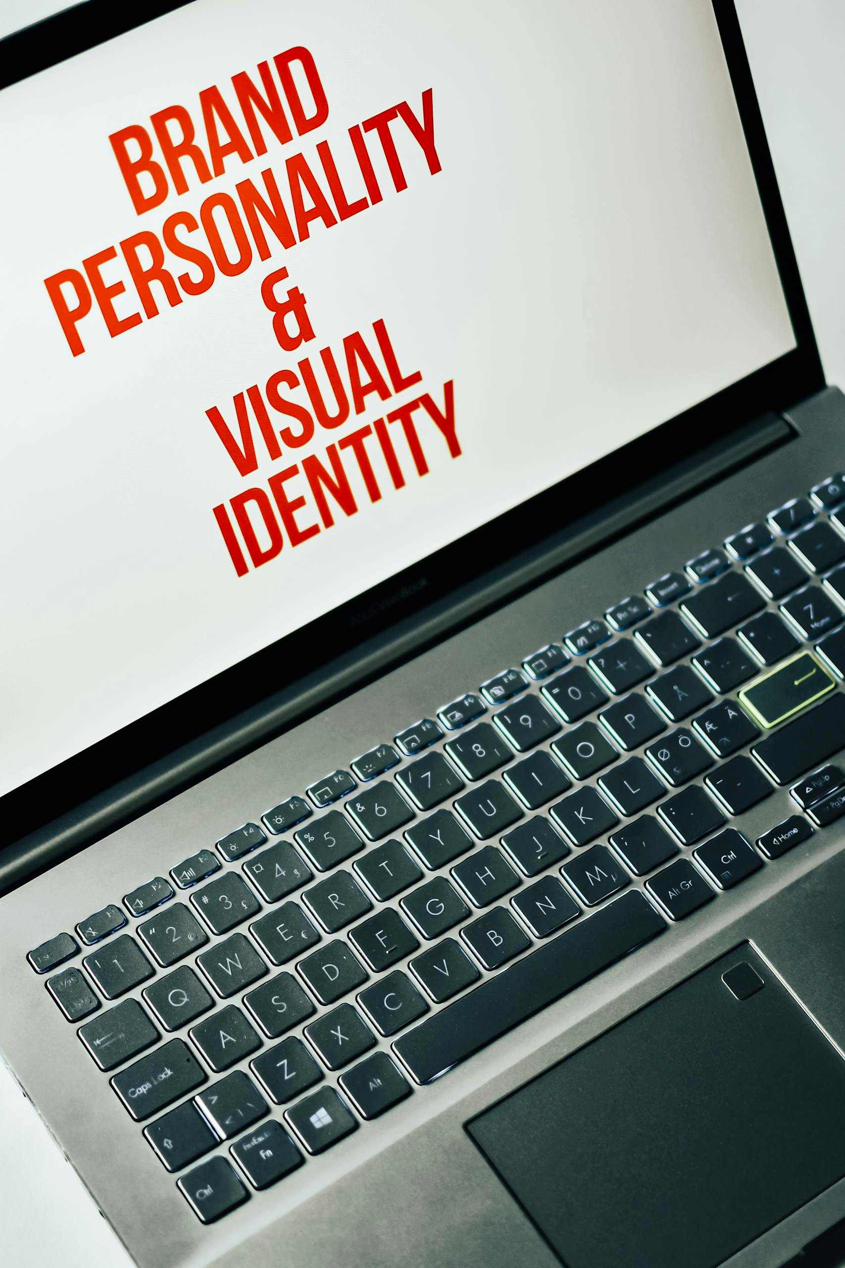 Laptop screen showing text on brand personality and visual identity for marketing strategy.
Ankara kurumsal kimlik tasarımı görseli